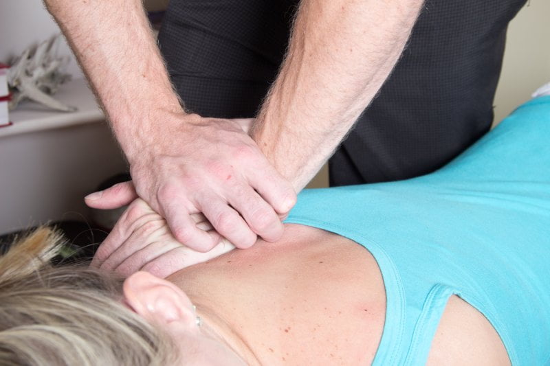 Chiropractor performing an adjustment - Chiropractic Adjustment in Meridian, ID